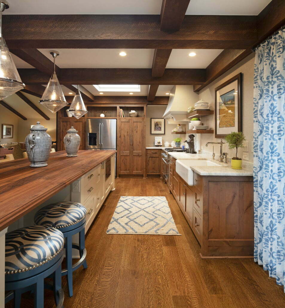 Natural wood farmhouse kitchen cabinets with large island