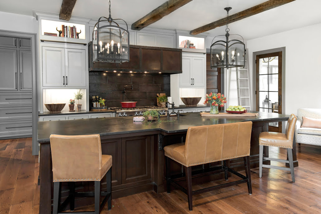 Dark wood kitchen island with leather bench seating view 2