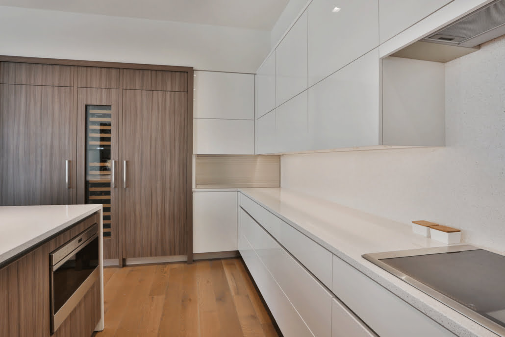Modern minimalist style white kitchen cabinets